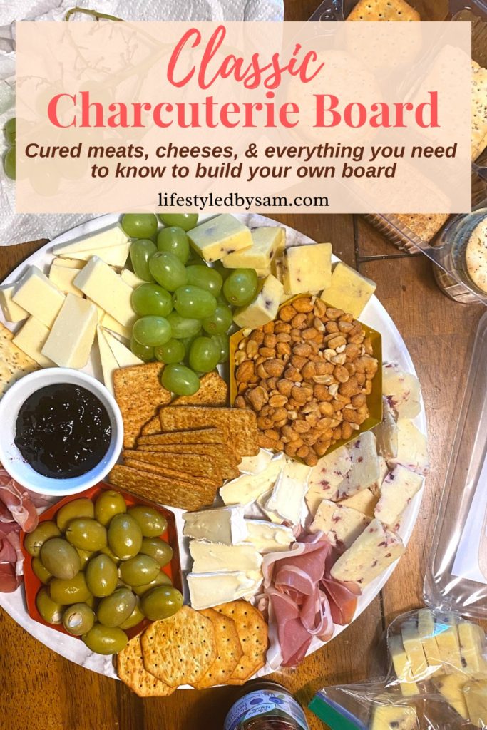 Pinterest pin for a classic charcuterie board post with ingredients