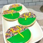 Football Sugar Cookies On Plate - Featured Image