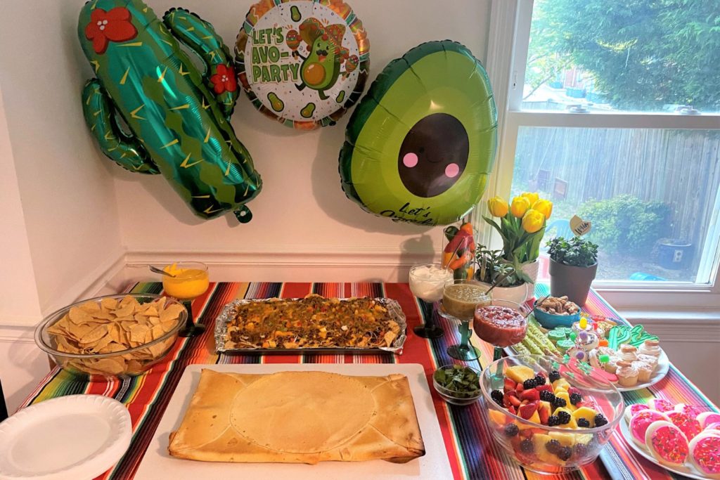 Cinco de Mayo Party foods and Desserts arranged on a table with Cinco de Mayo decorations