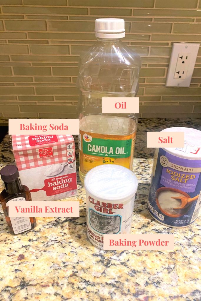 Baking essentials: oil, baking soda, baking powder, salt, vanilla extract