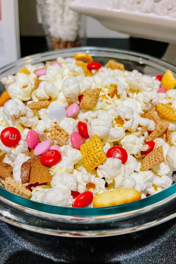 Popconr mixed with Chex mix and M&Ms