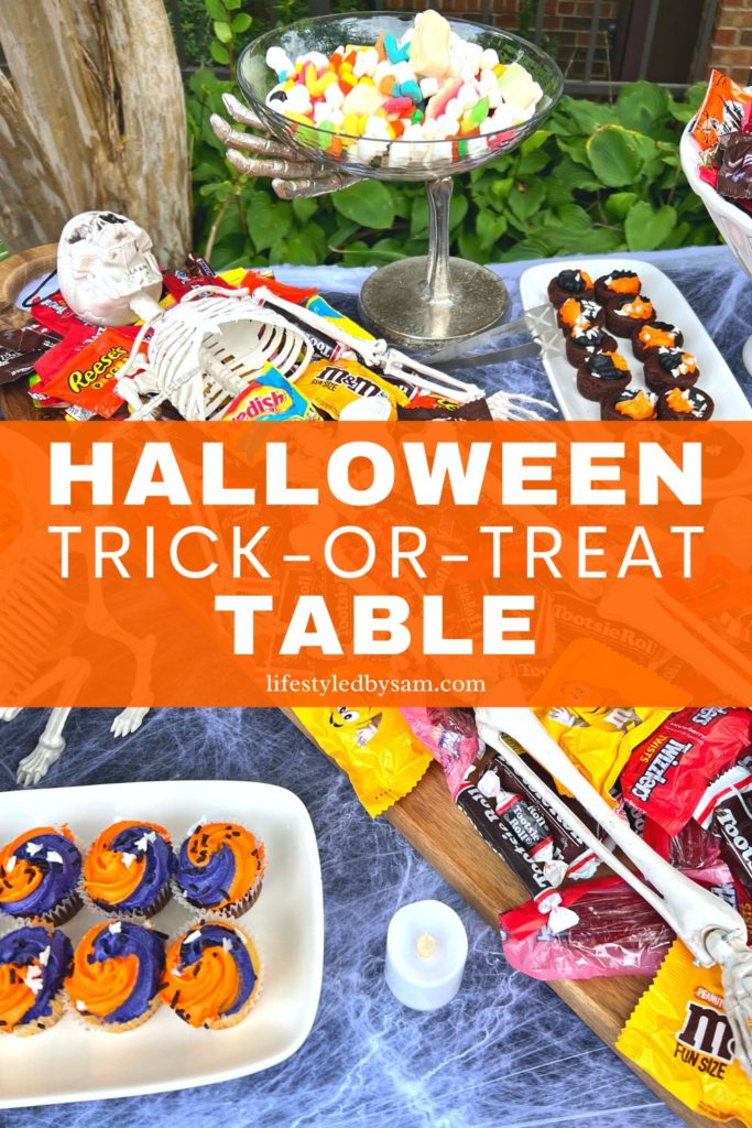 Pinterest Pin of A Halloween Trick or Treat Table With Skeleton