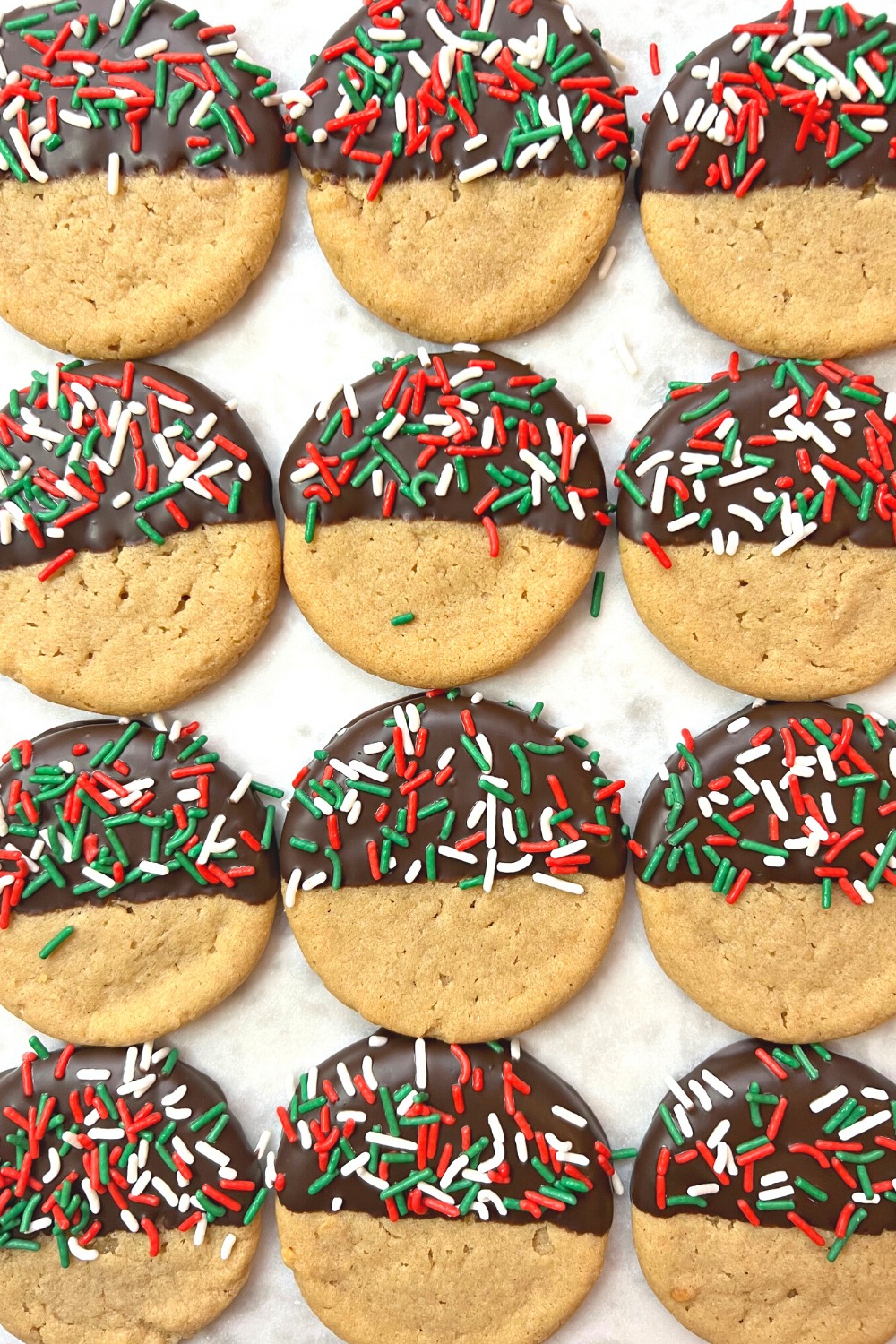 Close up of 12 Chocolate Dipped Peanut Butter Chirstmas Cookies