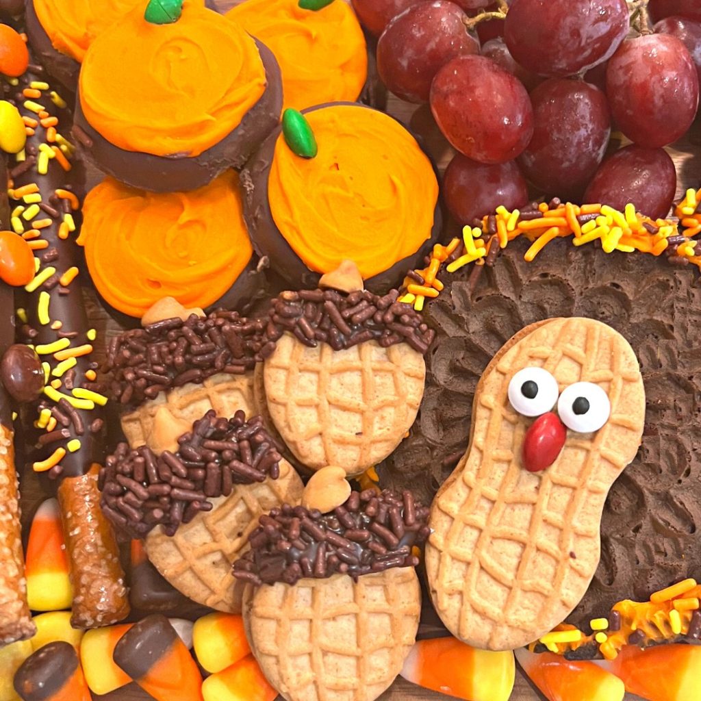 Featured image for the kid friendly Thanksgiving dessert board post