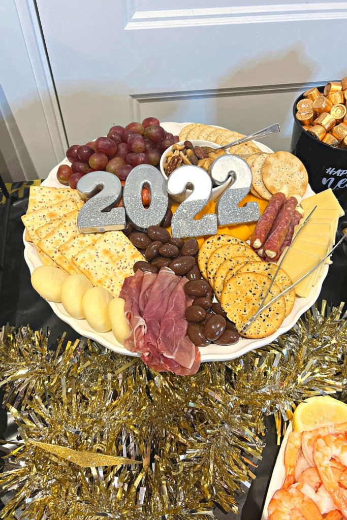 Charcuterie board with 2022 'decor'