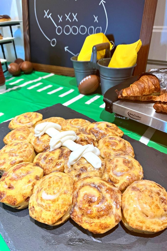 Cinnamon rolls shaped like a football